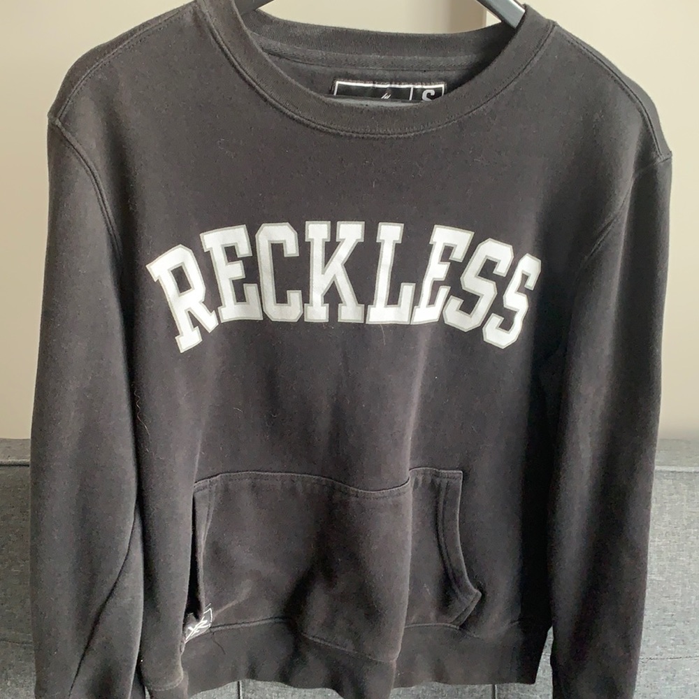 YOUNG AND RECKLESS SWEATER